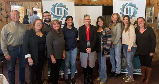 Photo by Chris PasterzGovernor Katie Hobbs (center) paid an unplanned visit to the RealAZ board meeting last week at La Cocina De Eva’s in Snowflake. The board consists of representatives from the various foundations, cities, support organizations and industries in Navajo and Apache counties. Pictured here with Gov. Hobbs are (left to right) Keith Johnson, town manager for Pinetop-Lakeside; Janet Dean, public affairs manager senior for Arizona Public Service; Henry Woltag, with Lava Run Wind Project near Springerville; Kathleen Smith, mayor of City of Holbrook; Trinidad Kechkian, with Lava Run Wind Project; Cindy Tafoya, director of the Holbrook Chamber of Commerce; Linda Kor, with the Joseph City Foundation; Desiree Fish, with the Joseph City Chamber of Commerce; and Marilyn Mott, director of community outreach with the Better Business Bureau.