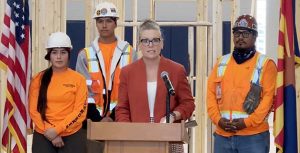 Photo courtesy of Northland Pioneer CollegeNPC graduates Ayana Trujillo Estrada a 2nd period apprentice (left) and Destin Bauer also a 2nd period apprentice (second from left), stand with Governor Katie Hobbs (second from right) and Victor Prieto journeyman ironworker (right) during a recent visit with the Iron Workers Union during National Apprenticeship Week.