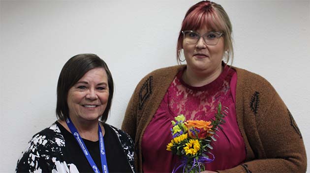 Photo courtesy of Northland Pioneer CollegeKathy McPherson (left) received the Crystal Eagle Emeritus award from Lead Campus Manager Jessica Kitchens (right) during the November meeting of the Navajo County Community College District Governing Board.