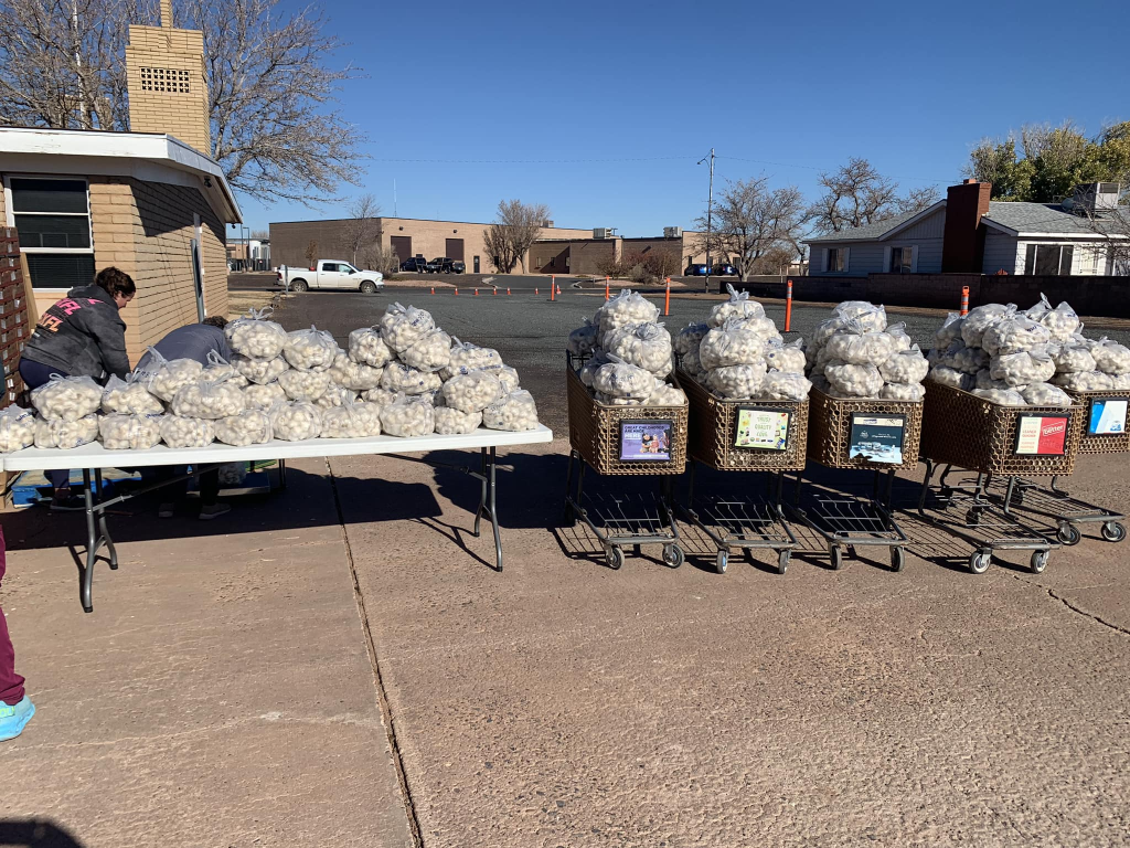 Photo courtesy of Mother Roads Farmer’s MarketOver 1,000 pounds of garlic were given away during Borderlands' Produce on Wheels With-Out Waste extra distribution event at the Methodist Church in Winslow. Held every third Wednesday, this program, in collaboration with the Winslow Rotary Club and Mother Road Farmers Market, offers up to 70lb boxes of high-quality rescued produce for just a $10 donation, saving families money on grocery bills, which especially comes in handy during the holiday season.