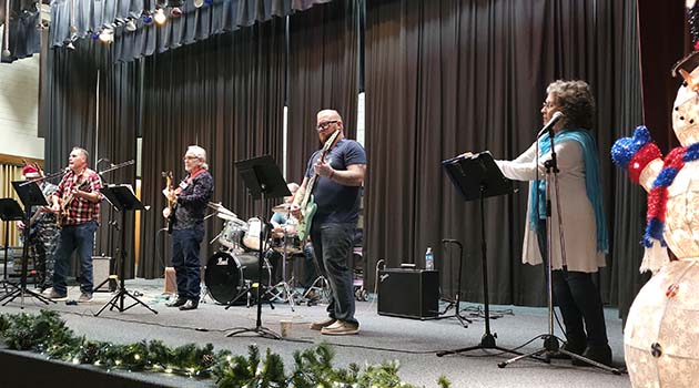 Photos by Linda KorThe Festival of Trees featured muscians from the community entertaining the visitors.