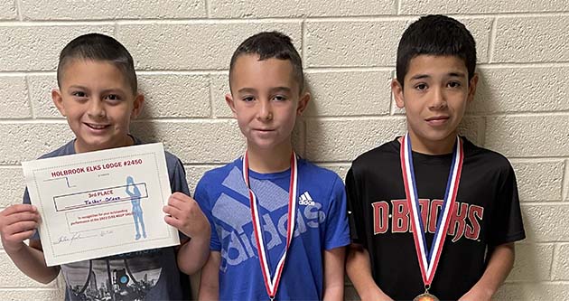 Photos courtesy of the Holbrook Elks LodgeWinners in the 8 to 9-year-old boy’s category of the Elks Hoop Shoot include Axton Baldonado (center), first place; Isaac Sandoval (right), second place; and Tucker Orton (left), third place.