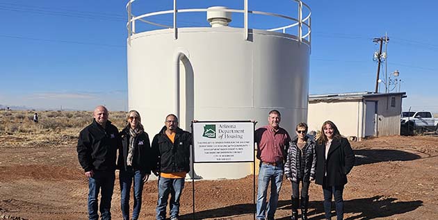 Photo by Linda KorPictured are (left to right) Rich and Vikki Church, owners of Southwest Tank and Steel, Holbrook Water/Wastewater Supervisor Daniel Gabaldon, City Manager Randy Sullivan, Code Ordinance Enforcer Barbara Blythe and Mayor Kathleen Smith.